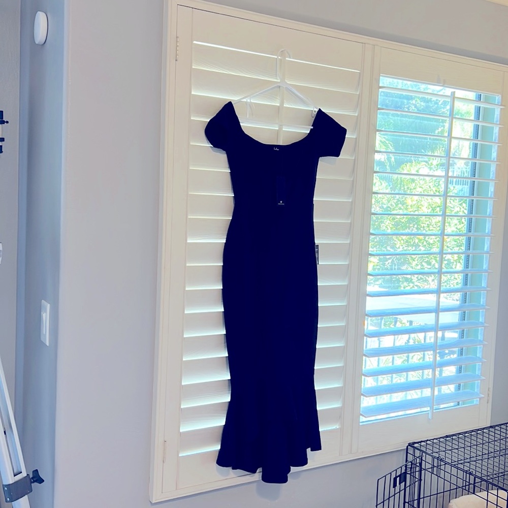Brand new lulus navy blue midi dress. Great for wedding guest or dressy event .